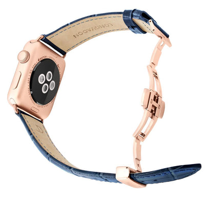 gold apple watch with navy blue leather band for men back view